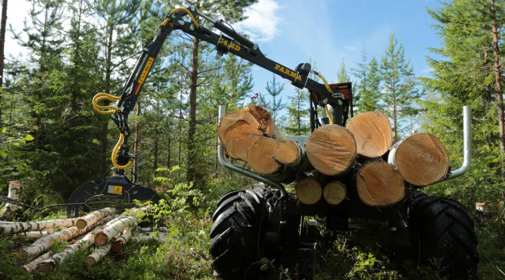 Logbullet mini forwarder navigating a forest trail